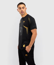 Charger l'image dans la galerie, T-SHIRT DRY TECH VENUM HEXAGONE MMA - NOIR/OR