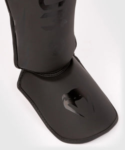 PROTÈGE-TIBIAS ET PIEDS VENUM CHALLENGER KIDS - NOIR/NOIR
