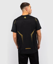 Charger l&#39;image dans la galerie, T-SHIRT DRY TECH VENUM HEXAGONE MMA - NOIR/OR
